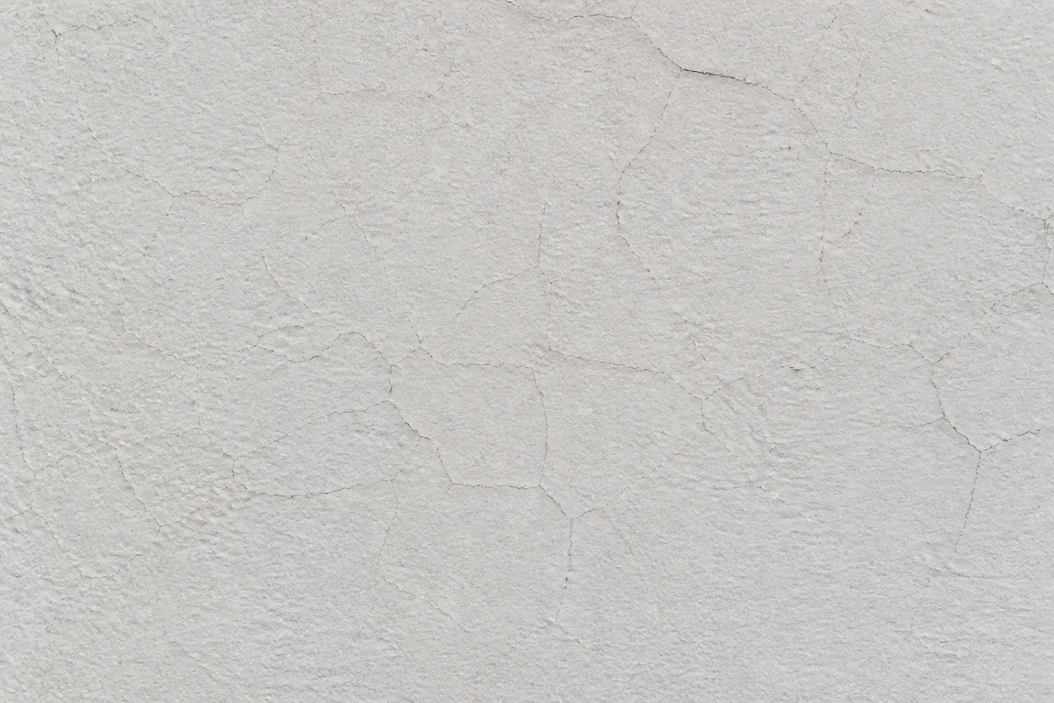 Microfissures en toile d araignee sur un enduit